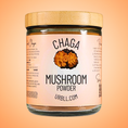Load image into Gallery viewer, Jar of Chaga mushroom powder with a wooden lid on an orange background