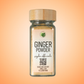 Load image into Gallery viewer, Jar of ginger powder with a label on an orange gradient background