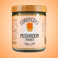 Load image into Gallery viewer, Jar of cordyceps mushroom powder with a label on an orange background
