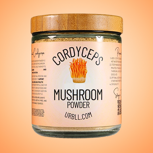 Jar of cordyceps mushroom powder with a label on an orange background