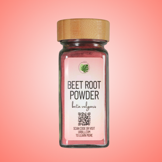 Jar of beet root powder with a label on a pink background