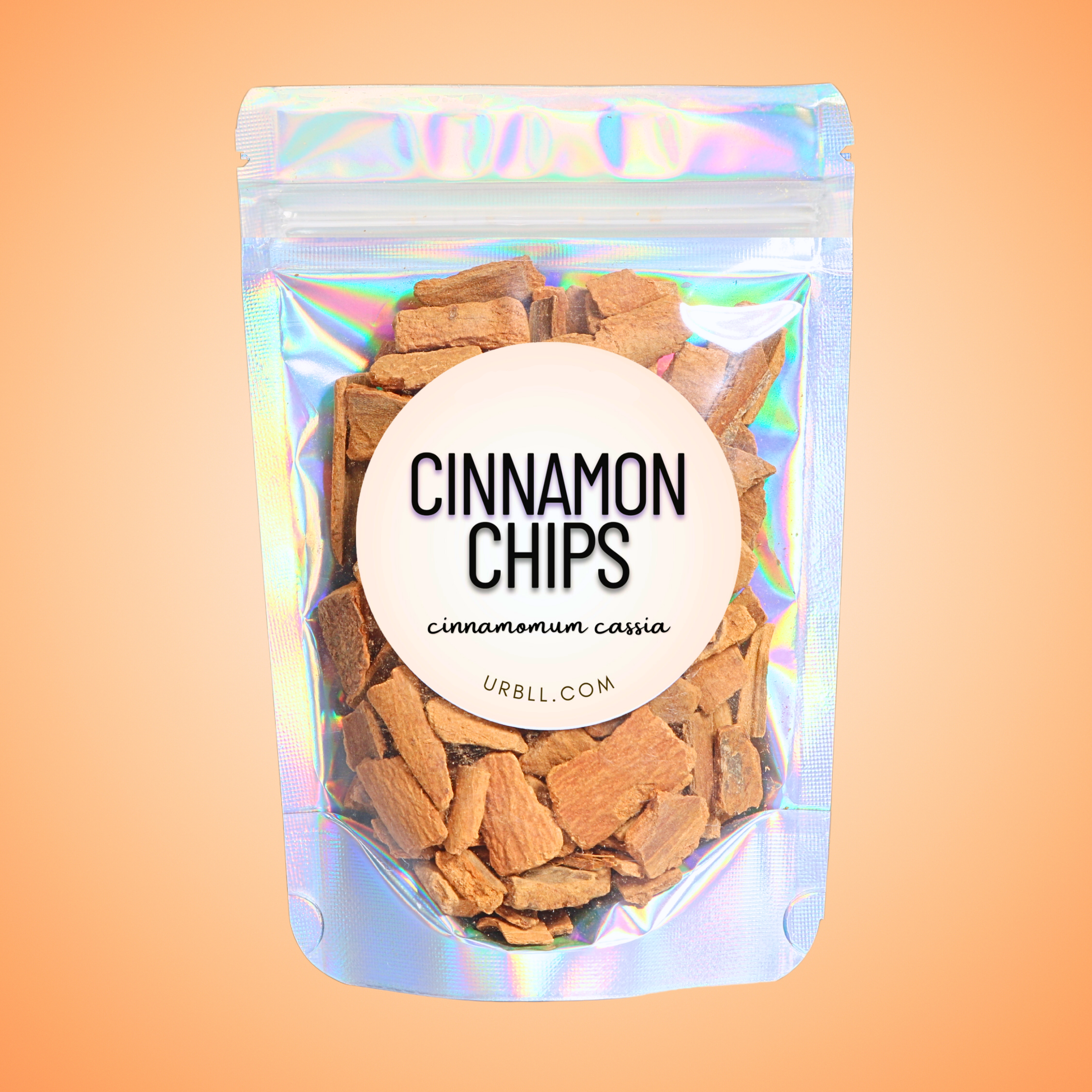 Packaging of cinnamon chips with a holographic finish on an orange background