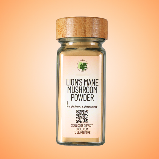Glass jar of lion's mane mushroom powder with a wooden lid on an orange gradient background.