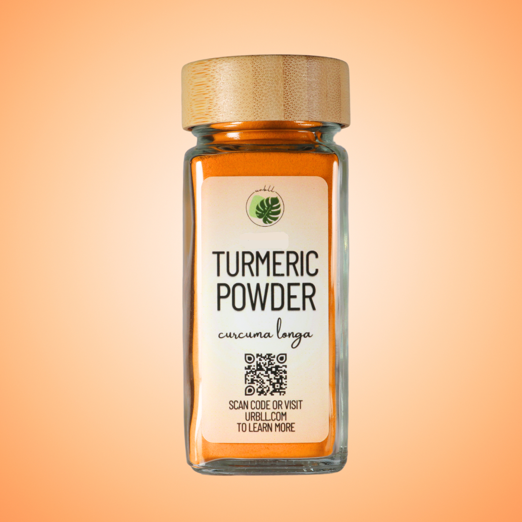 Jar of turmeric powder with a label on an orange gradient background